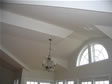 Factory installed ceiling beams create a different dimension and feel to a modular great room  